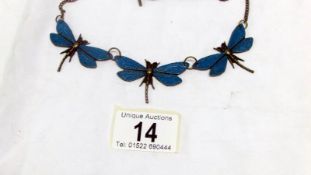 An enamel dragonfly necklace