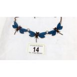 An enamel dragonfly necklace