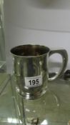 A 19th century silver plated tankard with 1890 Victorian crown set in bottom