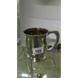 A 19th century silver plated tankard with 1890 Victorian crown set in bottom
