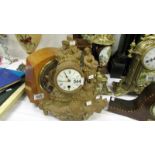 A spelter mantel clock