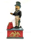 A cast iron Uncle Sam mechanical money box