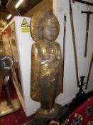 A large carved & gilded Eastern figure