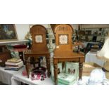 A pair of late 19th century oak hall chairs with tile inset in back