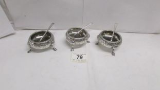 3 silver salts with silver spoons