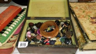 A jewellery box containing buttons