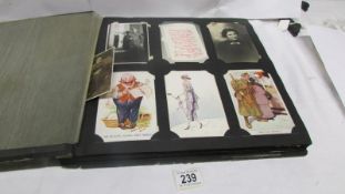 An album of in excess of 250 postcards including military, topographical,