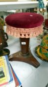 A Victorian mahogany piano stool