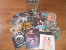 A box of approximately 60 progressive and classic rock LP records including King Crimson,