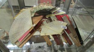 A collection of mainly Chinese and hand painted fans,