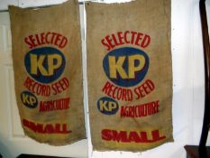 A pair of KP seed sacks