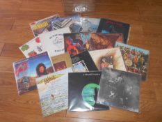 A box of approximately 60 progressive and classic rock LP records including Beatles, Led Zeppelin,