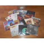 A box of approximately 60 progressive and classic rock LP records including Beatles, Led Zeppelin,