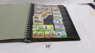 An album of mainly mint Disney stamps, Angilla, Belize, Dominica, Grenada etc,