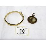 A rolled gold bracelet and a photo fob
