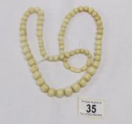 An ivory bead necklace