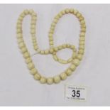 An ivory bead necklace