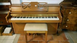 A modern piano and stool