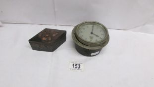 A pre war Smith's car clock and a spelter trinket box