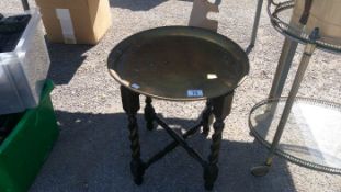 A brass topped table