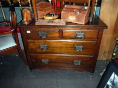 A mahogany 2 over 2 chest of drawers