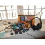 8 Skylanders figurines a Turtle beach headset, Lion king dvd etc