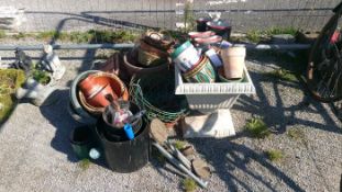 A quantity of garden pots & wellington boots etc.