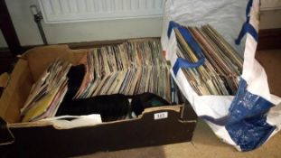 A quantity of records including singles