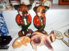 4 wooden pig figures