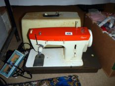 A Capri sewing machine (in case)