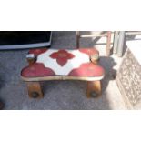 A saddle stool