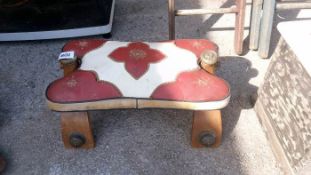 A saddle stool