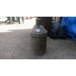 A galvanised milk churn