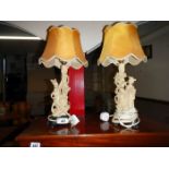 A pair of Chinese figural table lamps