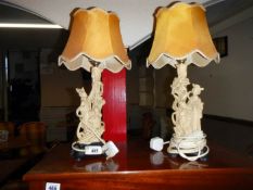 A pair of Chinese figural table lamps
