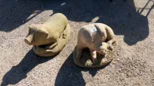 2 garden pig ornaments