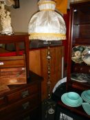 A gilt metal standard lamp & shade