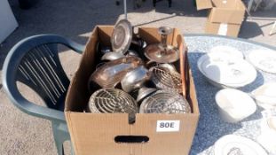 A box of silver plated items