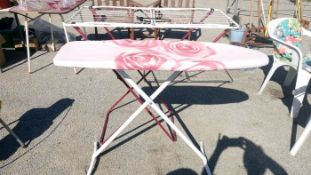 An ironing board & airer