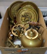 A box of brassware including teapot on legs etc