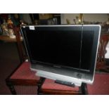 A 32" Technosonic flat screen TV