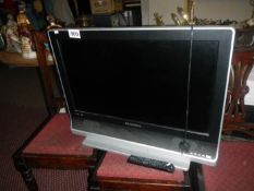 A 32" Technosonic flat screen TV