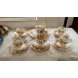 A 21 piece Royal Albert tea set (1 cup A/F)