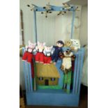 A large theatre puppet show with 7 puppet characters