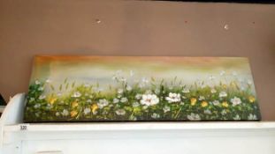 A oil on canvas of flowers