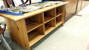 A large coffee table with shelves