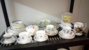 A shelve of pottery & china