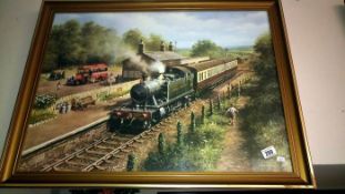 A framed & glazed print of a steam train