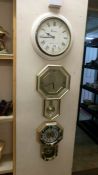 3 wall clocks