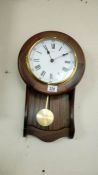 A Tempora quartz mahogany wall clock